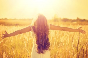 Autumn Girl enjoying nature on the field. Beauty Girl Outdoors r